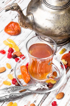 turk tea with nuts and oriental sweets.Tea still lifeの写真素材
