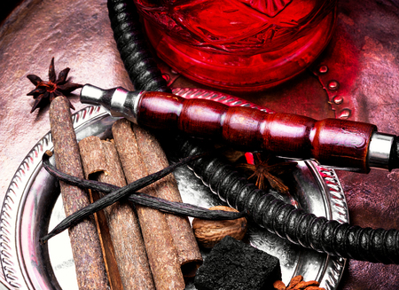 Smoking Turkish hookah with a taste of spices, cinnamon, tubby, vanilla