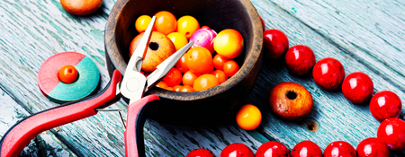 Beads, coral beads and tools for needleworkの写真素材