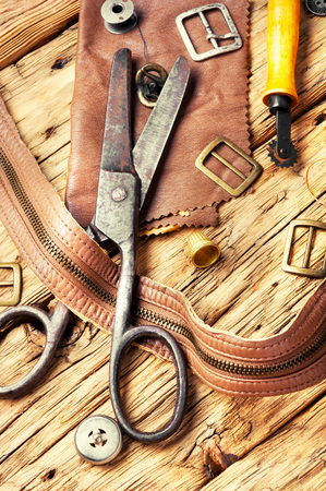 Working tools and cut out pieces of leatherの写真素材