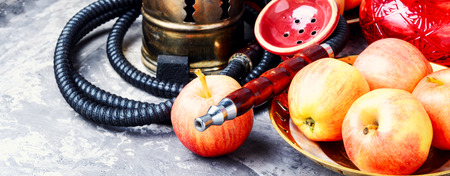 Smoke hookah with apple.Shisha concept.Hookah concept.Fruit hookahの写真素材