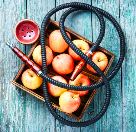 Smoke hookah with red apple.Shisha concept.Hookah concept