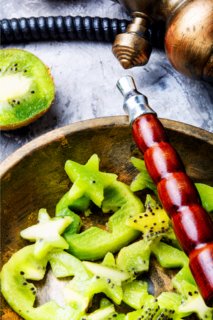 Oriental hookah with the aroma kiwi for relax.Kiwi shishaの写真素材