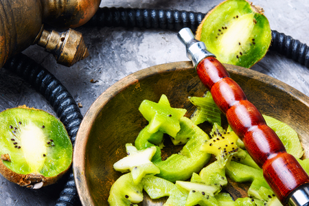 Oriental hookah with the aroma kiwi for relax.Kiwi shishaの写真素材