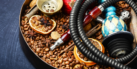 Smoke hookah with with coffee beans and shisha concept.Hookah concept