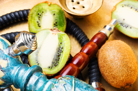 Oriental hookah with the aroma kiwi for relax.Kiwi shishaの写真素材