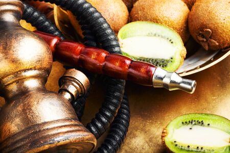 Oriental hookah with the aroma kiwi for relax.Kiwi shisha