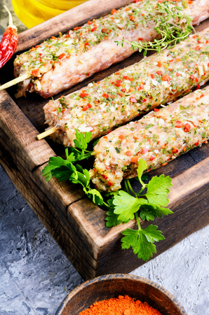Raw turkish traditional dish meat kebab with herbs and spices.Eastern foodの写真素材