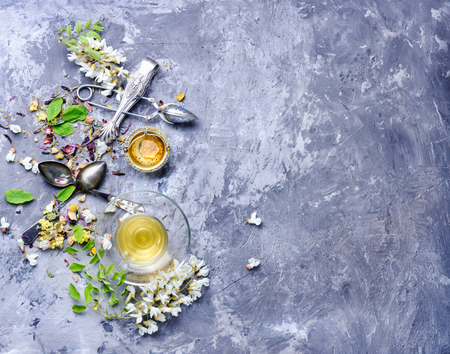 Healing herbal tea with honey from acacia flowers.の写真素材