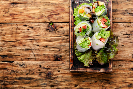 Assorted Asian spring rolls with vegetable and lettuceの写真素材