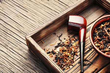 Classic tobacco smoking pipe with dried tobacco.Smoking.の写真素材