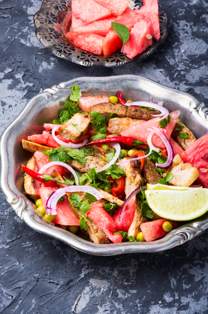Summer salad with beef meat, watermelon and lime.Exotic foodの写真素材