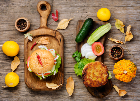 Diet hamburger with fresh vegetables and pumpkin cutlet.Appetizing squash burgersの写真素材