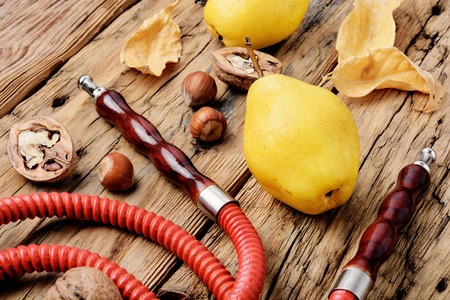 Oriental shisha hookah with aroma pear for relax.Pear shisha.Autumn hookah menuの写真素材