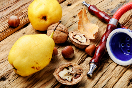 Oriental shisha hookah with aroma pear for relax.Pear shisha.Autumn hookah menuの写真素材