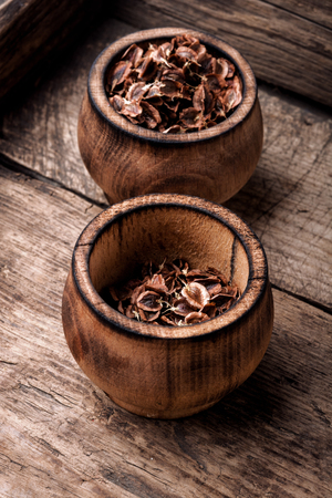 Rhubarb seeds on a wooden table.Seed preparation for sowingの写真素材