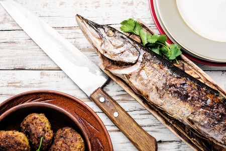 Baked grilled fish.Pike fish stuffed with mushrooms.Pike royally. Russian cuisineの写真素材