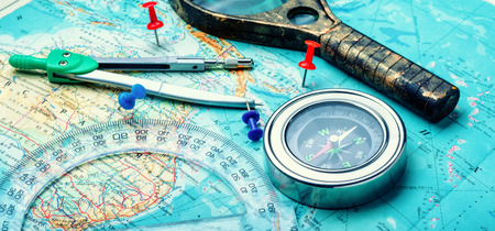 Retro compass with vintage map.Travel planning concept on mapの写真素材