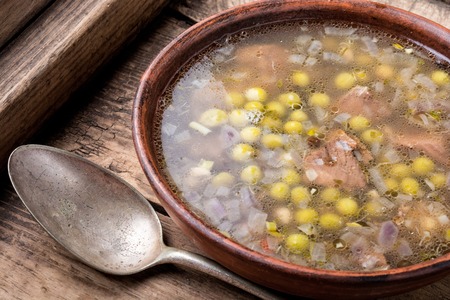 Peruvian chicken soup with cilantro and quinoa.Aguadito de Polloの写真素材