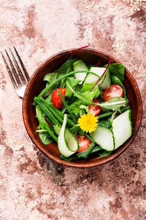 Fresh salad with mixed greens.の写真素材