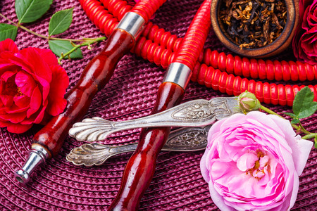 Smoking hookah with floral tobacco flavor
