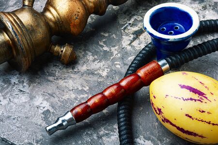 East shisha.Hookah tobacco with taste of ripe pepino.Smoking egyptian hookahの写真素材