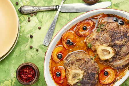 Ossobuco, traditional dish of Italian cuisine. Stewed veal legの写真素材