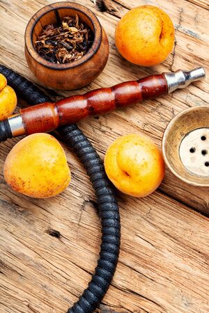 Details of the eastern kalian.Hookah with apricots flavor.Smoking apricots tobaccoの写真素材