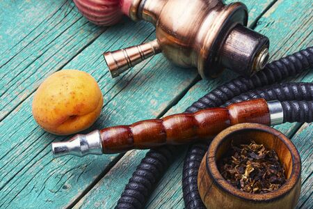 East shisha.Hookah tobacco with taste of ripe apricots.Smoking oriental hookahの写真素材
