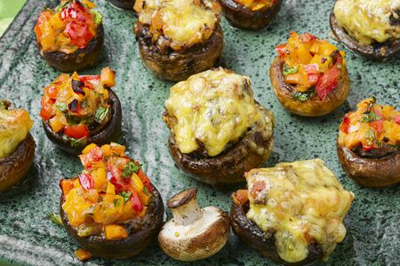 Italian stuffed mushroom caps stuffed on plate.Autumn foodの写真素材