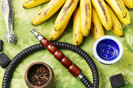 Oriental tobacco shisha with banana aroma.Kalian with bananaの写真素材