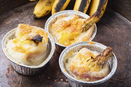 Baked fish with banana.の写真素材