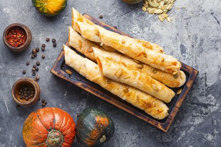Moldovan pie made of yeast puff pastry.Pie with pumpkin.Placintaの写真素材
