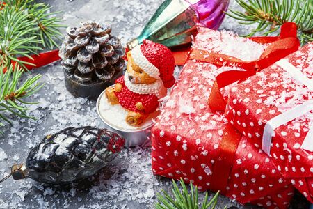 Christmas background with red gift box and decor.Xmas compositionの写真素材
