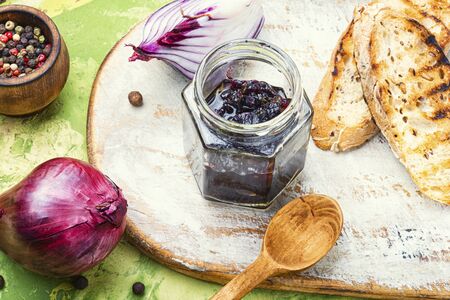 Homemade red onion jam.Onion confiture and bread toastの写真素材