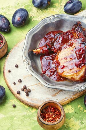 Grilled meat. Grilled meat with autumn plum.Bbqの写真素材