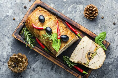 Appetizing meat terrine on the kitchen board.Holiday foodの写真素材