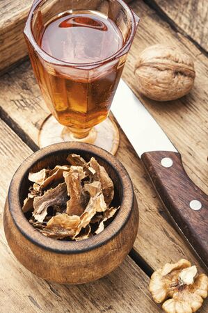 Medicinal tincture from walnut partitions.Walnut partitions.Healing potionの写真素材