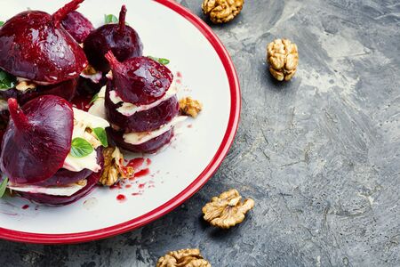 Boiled beetroot with soft cheese and walnutの写真素材