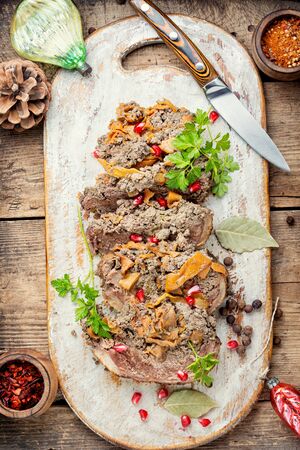 Festive Christmas food.Stuffed duck breast with chicken liverの写真素材