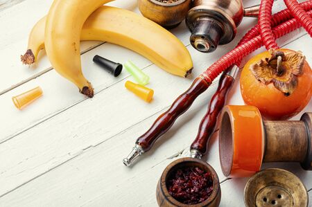 Details of Egyptian hookah and shisha tobacco with fruit flavors.Nargile and exotic fruits.