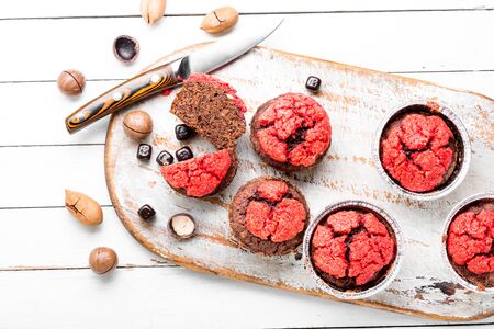 Homemade delicious muffins with nuts and chocolate.の写真素材