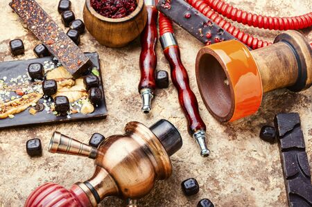 Egyptian hookah with the taste of sweets.Arabian shisha with chocolateの写真素材