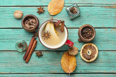 Traditional autumn alcoholic drink.Warm pear mulled wine.Pear wine with spices.の写真素材