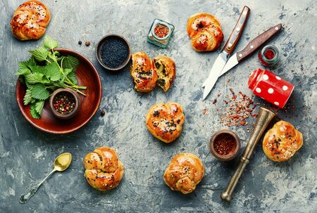 Homemade rustic nettle and spinach buns.の写真素材