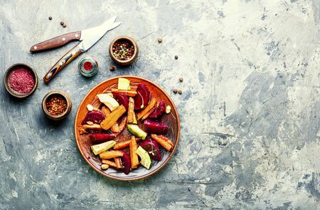Diet salad with caramelized carrots, avocado and beets.Fresh saladの写真素材