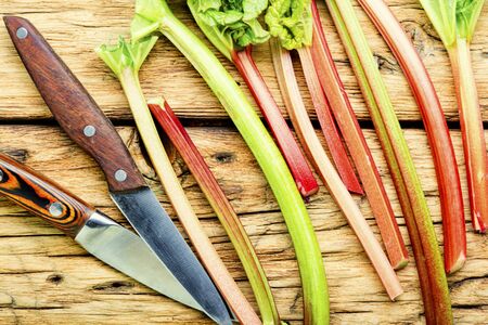 Fresh rhubarb stem on old wooden table.Food conceptの写真素材