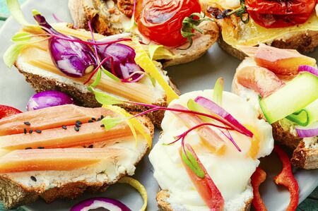 Set of delicious Italian bruschettas with grilled vegetables.の写真素材