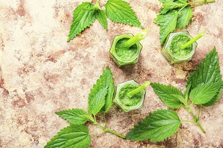 Green smoothie from nettle leaves.Green fresh healthy juice.Copy spaceの写真素材
