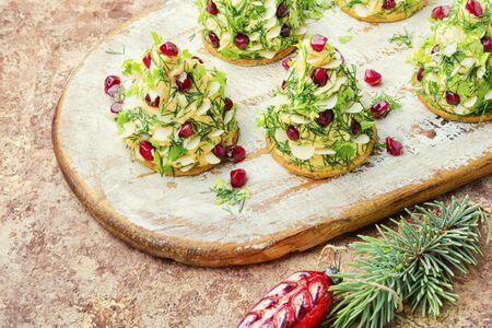 Christmas canapes or tartlet made of cheese,mayonnaise and garlic.の写真素材